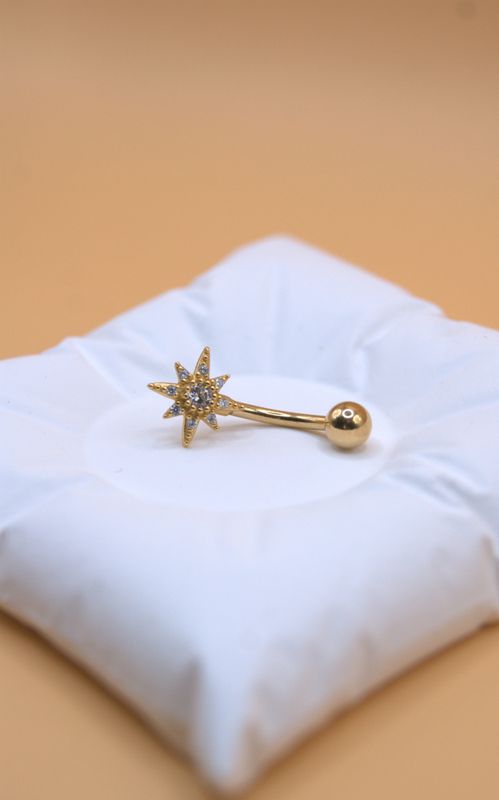 Golden Comet navlepiercing
