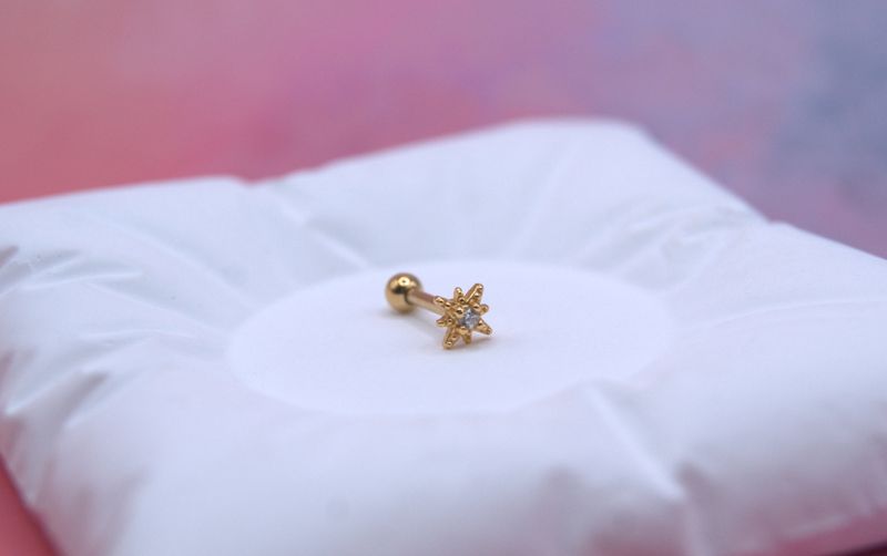 Golden Sparkle piercing