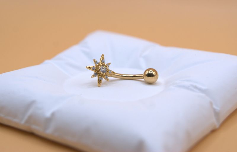 Golden Comet navlepiercing